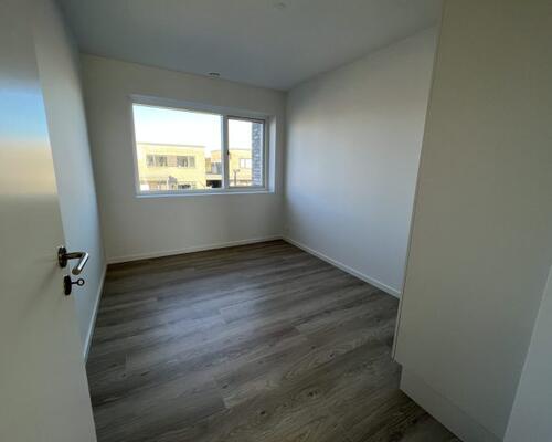 Moderne og velindrettet 2-plans rækkehus i attraktive Kildebjerg Ry