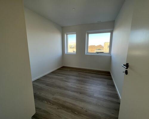 Moderne og velindrettet 2-plans rækkehus i attraktive Kildebjerg Ry