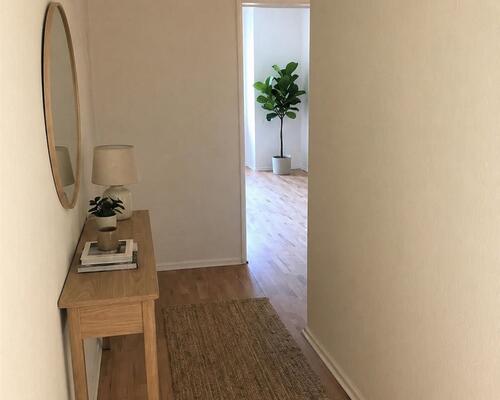 Lys 2-værelses på 66 m2 med altan/terrasse, parkering og ladestander