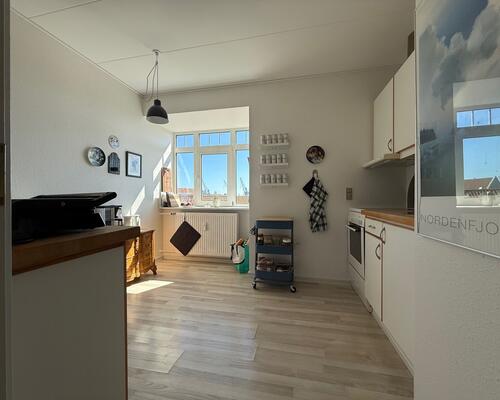 Hyggelig 2 værelses lejlighed med lille altan
