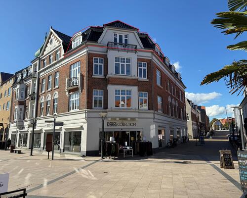 Hyggelig 2 værelses lejlighed med lille altan