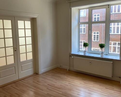 Dejlig 3'er i centrum med stor altan