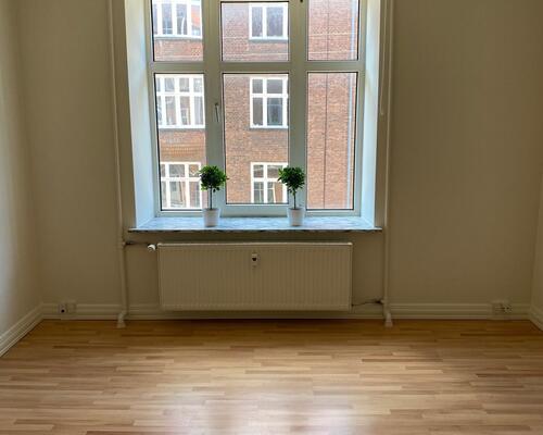 Dejlig 3'er i centrum med stor altan