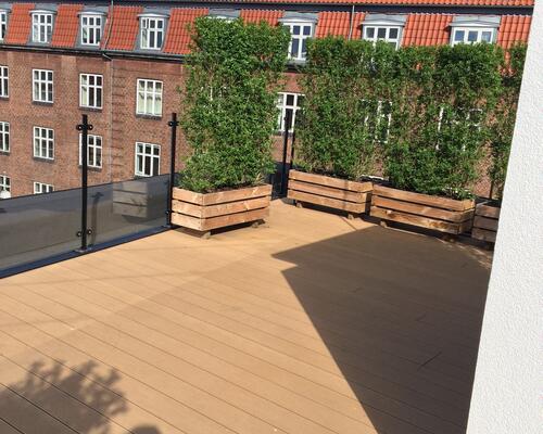 Unik 3-værelses med altan og adgang til stor tagterrasse – centralt beliggende