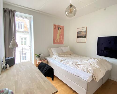 Delevenlig lejlighed beliggende helt i centrum, adgang til tagterrasse