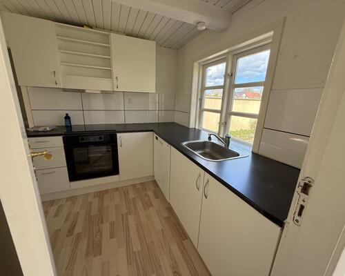 Fint hus på 114 m² med 4 værelser og sydvendt have i sydbyen