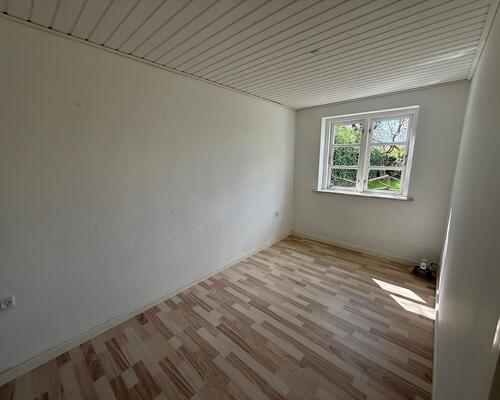 Fint hus på 114 m² med 4 værelser og sydvendt have i sydbyen