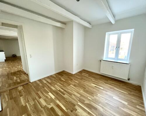 Er du træt af kedelige kasser? Flyt ind i Koldings hyggeligste ”top-etage”!