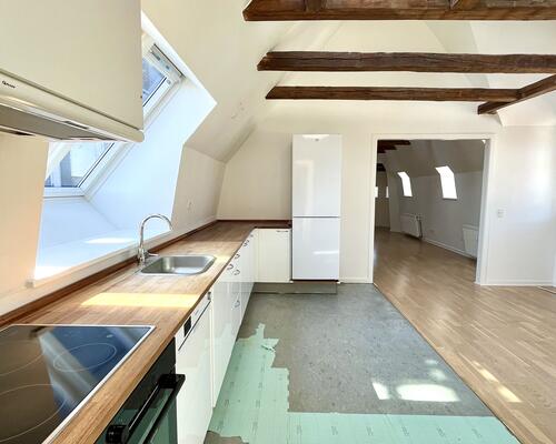 Loft til kip og masser af lys: En sjælden arkitektonisk perle i hjertet af byen
