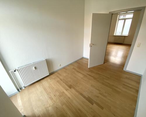 Lys lejlighed i hjertet af Odense med byliv lige udenfor