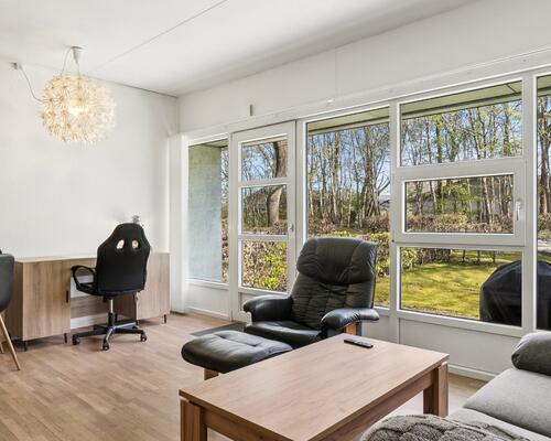 Hyggelig og lys lejlighed med stor have