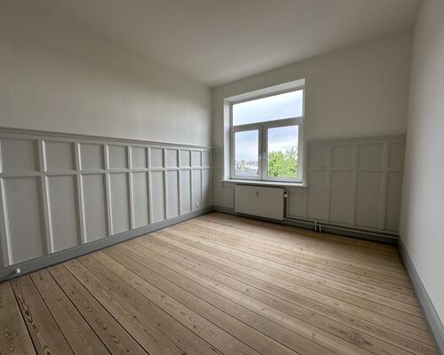 Rummelig lejlighed med central beliggenhed i Odense