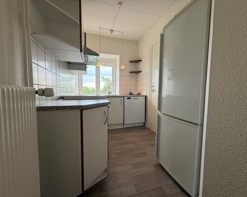 Dejlig lys 3-værelses et stenkast fra gågaden