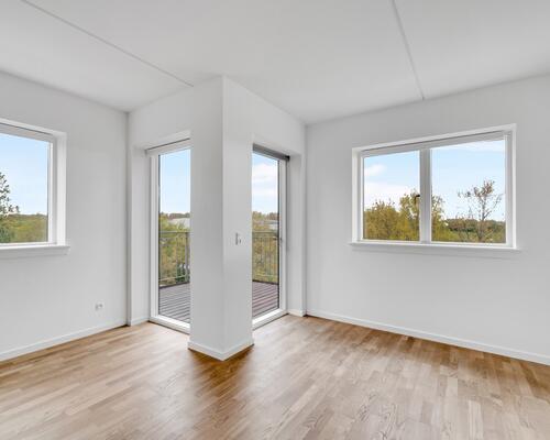 Skøn lys lejlighed med stor altan