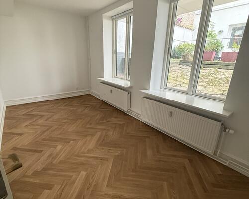 Eksklusivt townhouse i tre plan med 3 soveværelser og med store altaner på attraktive Frederiksberg C