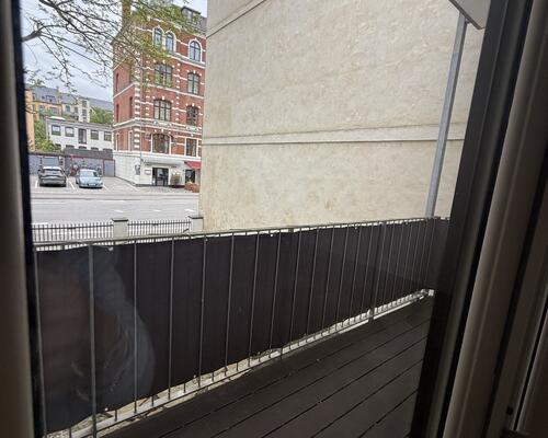 Eksklusivt townhouse i tre plan med 3 soveværelser og med store altaner på attraktive Frederiksberg C