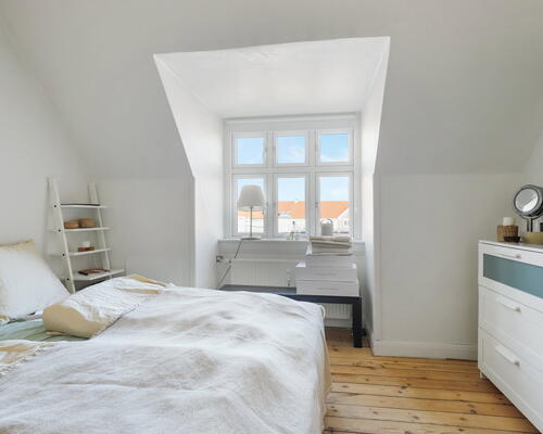 Eksklusiv penthouselejlighed med hems og altan