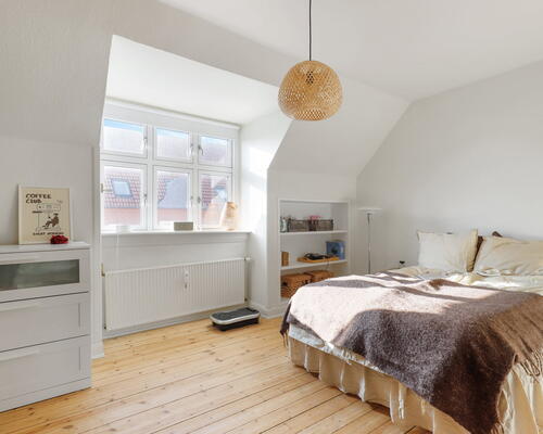 Eksklusiv penthouselejlighed med hems og altan