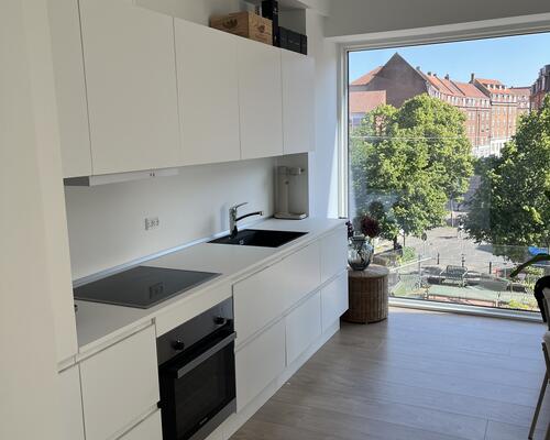 Lys 2-værelses lejlighed med STOR PRIVAT Terrasse og udsigt til Aarhus Å