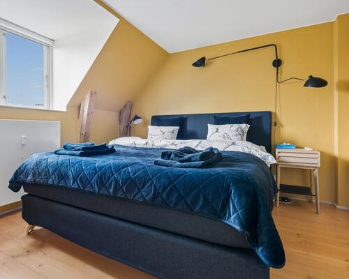 Eksklusiv møbleret penthouse med privat tagterrasse og panoramaudsigt over København til udlejning for 6-12 mdr.