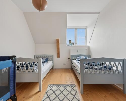 Eksklusiv møbleret penthouse med privat tagterrasse og panoramaudsigt over København til udlejning for 6-12 mdr.