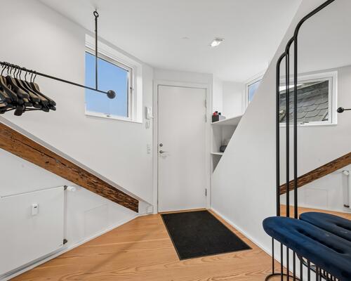 Eksklusiv møbleret penthouse med privat tagterrasse og panoramaudsigt over København til udlejning for 6-12 mdr.
