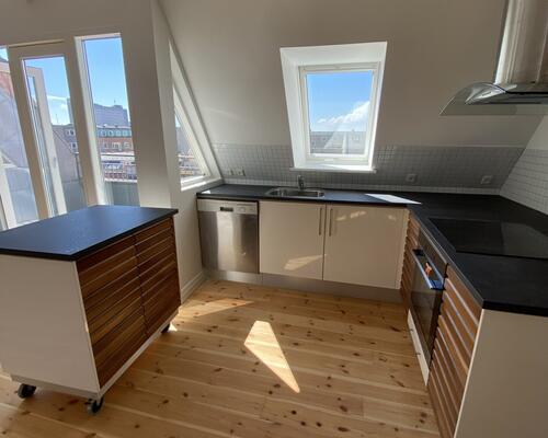 Charmerende taglejlighed i hjertet af Aalborg
