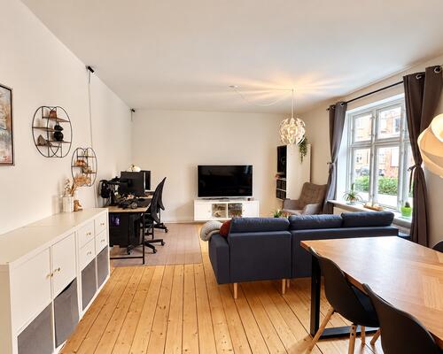 Moderne lejlighed i Øgadekvarteret med skøn atmosfære