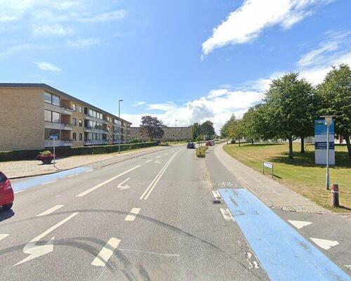 Modern Lejlighed med Lys og Komfort