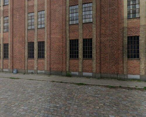 New Yorker-inspireret 2-værelses på 72 m2 i Aalborg Vestby – rå detaljer, glasvæg og elevator