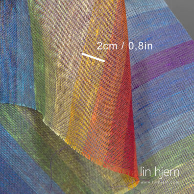 100% lin med regnbue striper.