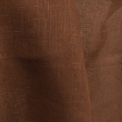 Gjennomsiktig linstoff i brun farge.