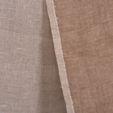 Tosidig linstoff i lys rosa og lys brun farge.