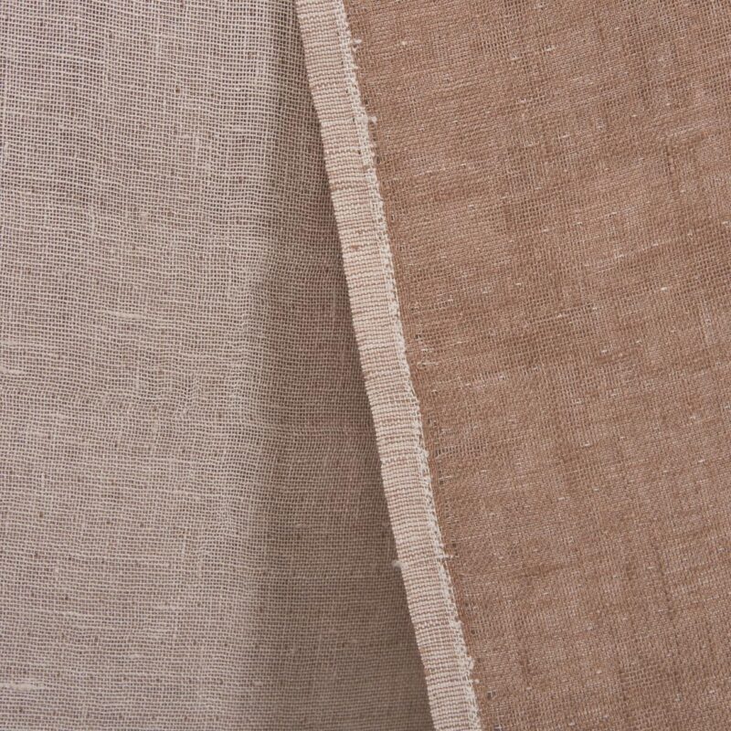 Tosidig linstoff i lys rosa og lys brun farge.