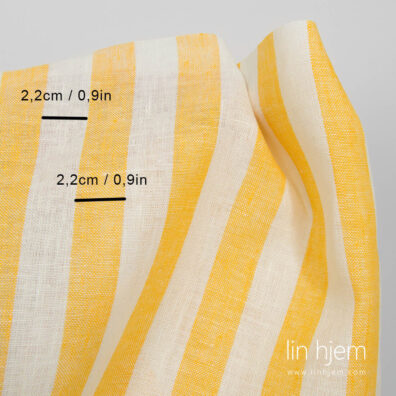 Stripete linstoff i gul farge.