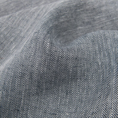 Linstoff med gran mønster i svart/hvit farge til å sy klær, hjemmetekstiler