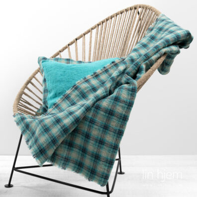 Linpledd i grønne ruter.