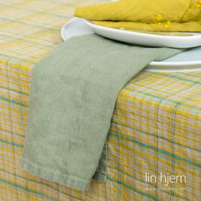 Grønnaktig vasket linserviett.