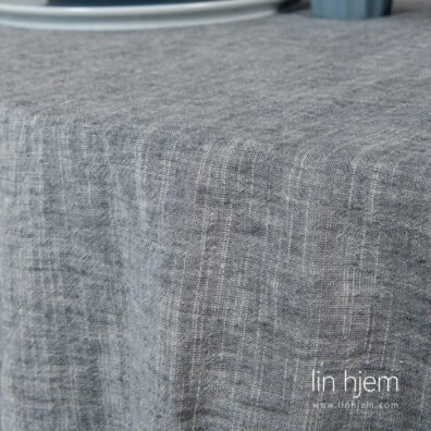 Rund vasket duk i lin-bomull, mørk grå farge.