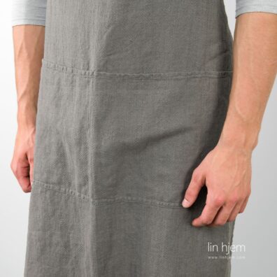 Mørkegrått linforkle, mønstret.