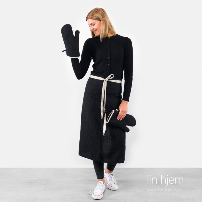 Langt linforkle i svart farge.