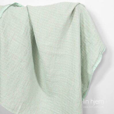 Grønnaktig linstoff, vasket.