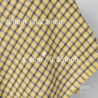 Gult/brunt vasket linstoff.