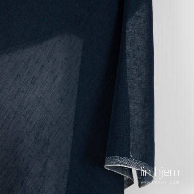 Gjennomsiktig linstoff i blåaktig svart farge.