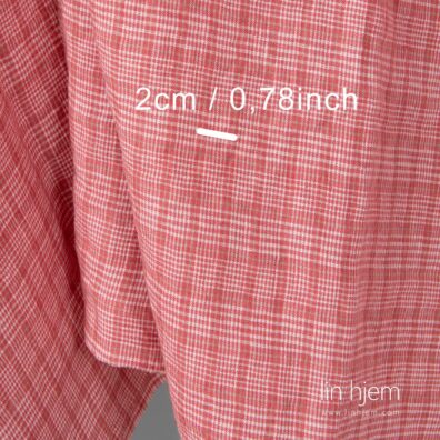 Vasket linstoff i rosa farge, rutete.