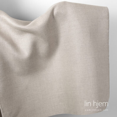 Grått linstoff med vaffel ruter.