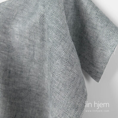 Gran mønstret linstoff i blå/hvit.