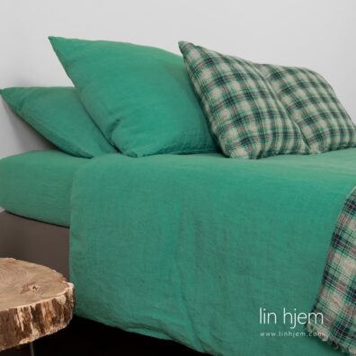 Grønt sengesett i lin.