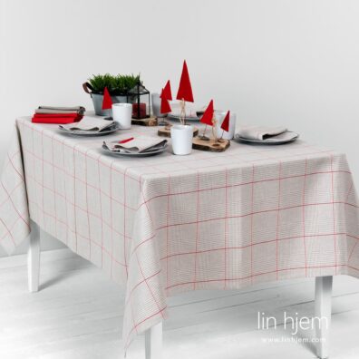 Halvlin duk i grå ruter.