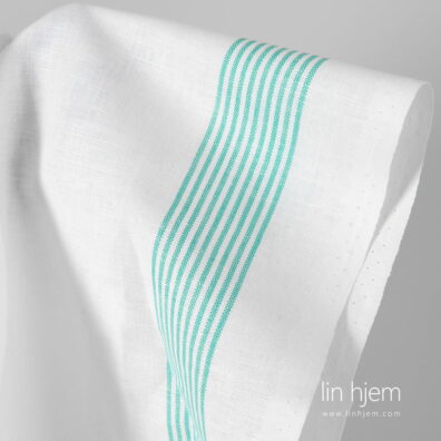 Halvlin stoff med grønne striper.